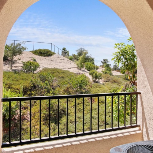 a view of a hill from a window