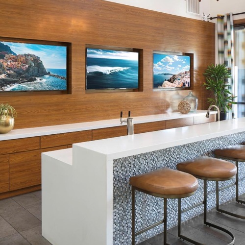 a bar with stools and a bar stool