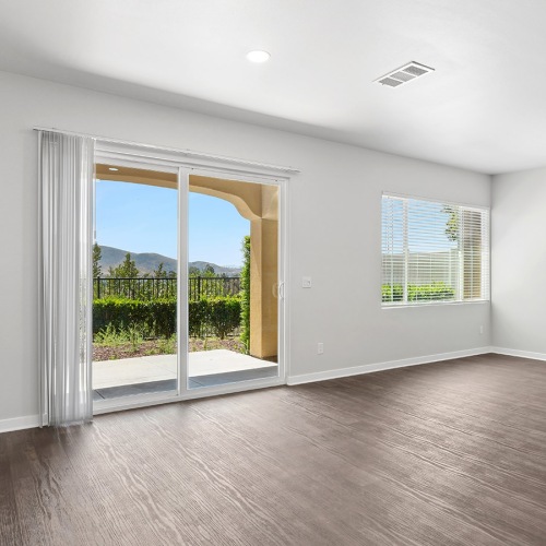 living room with wood floors and patio doors