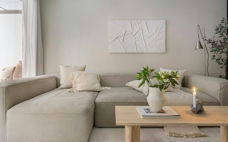 a living room with a couch and a coffee table